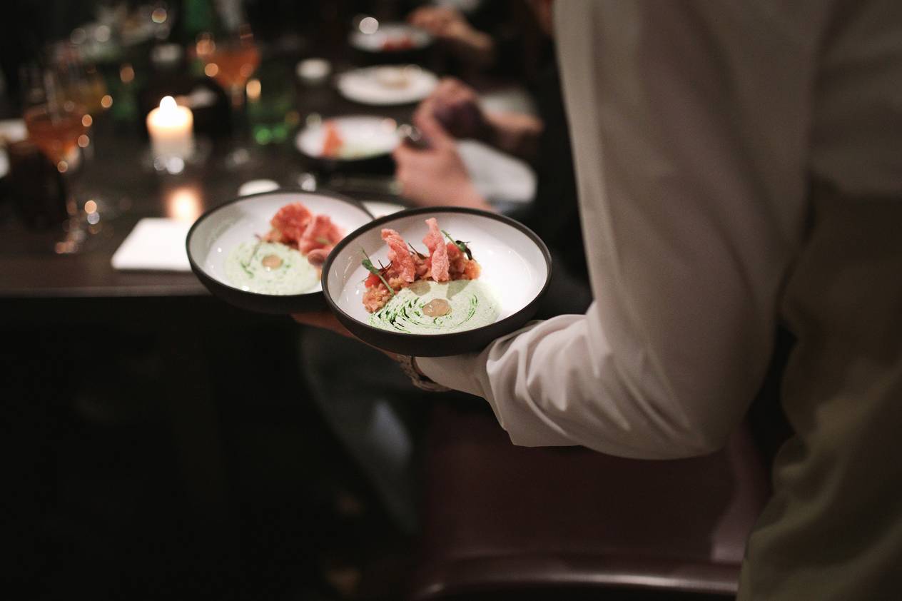 Chef-prepared gourmet dishes served in an elegant dining setting