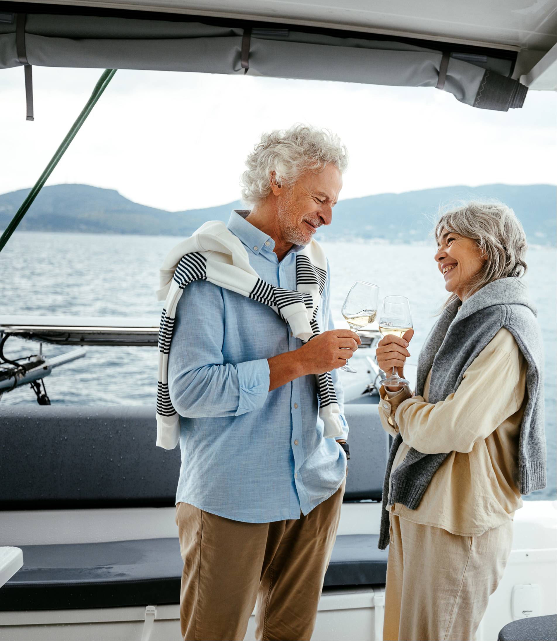 Couple enjoying a toast with scenic views
