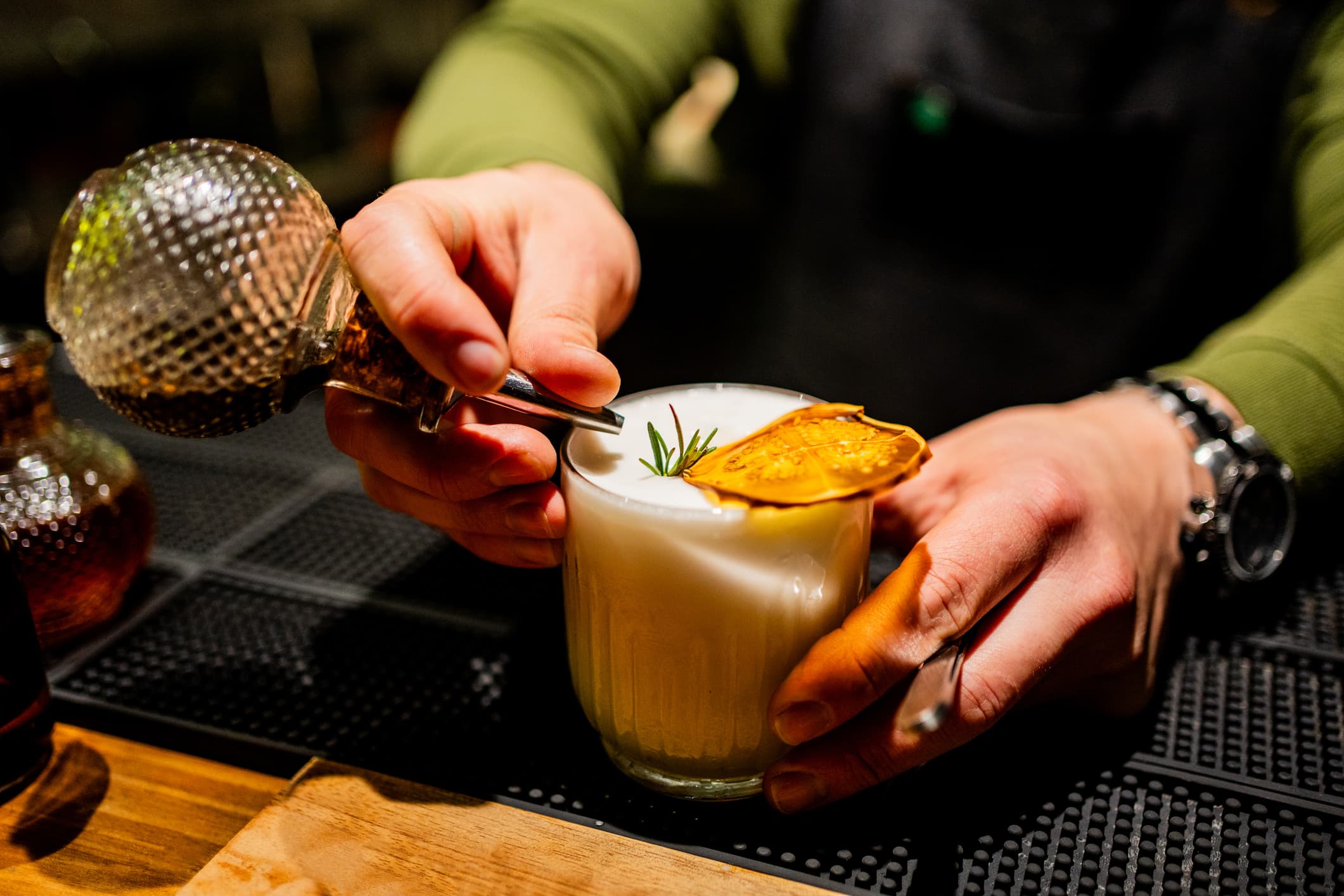 Handcrafted cocktail prepared at the resident bar at The Sinclair