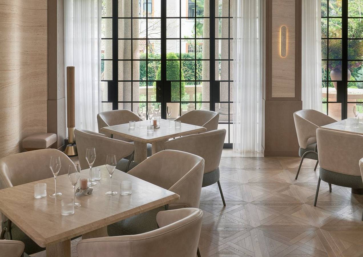 Detail of an elegant lounge chair highlighting refined finishes and comfort